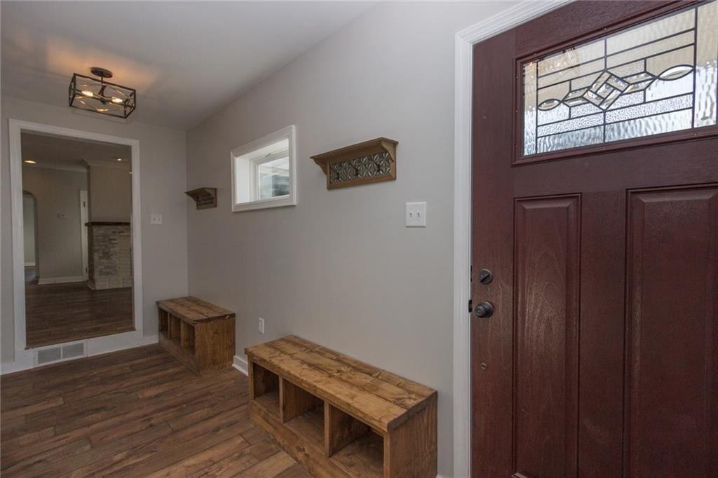 463 Center Grange Road Monaca, PA 15061 - Photo 4 of 21 The mud room with built inns, beautiful flooring throughout, and plenty of natural light.