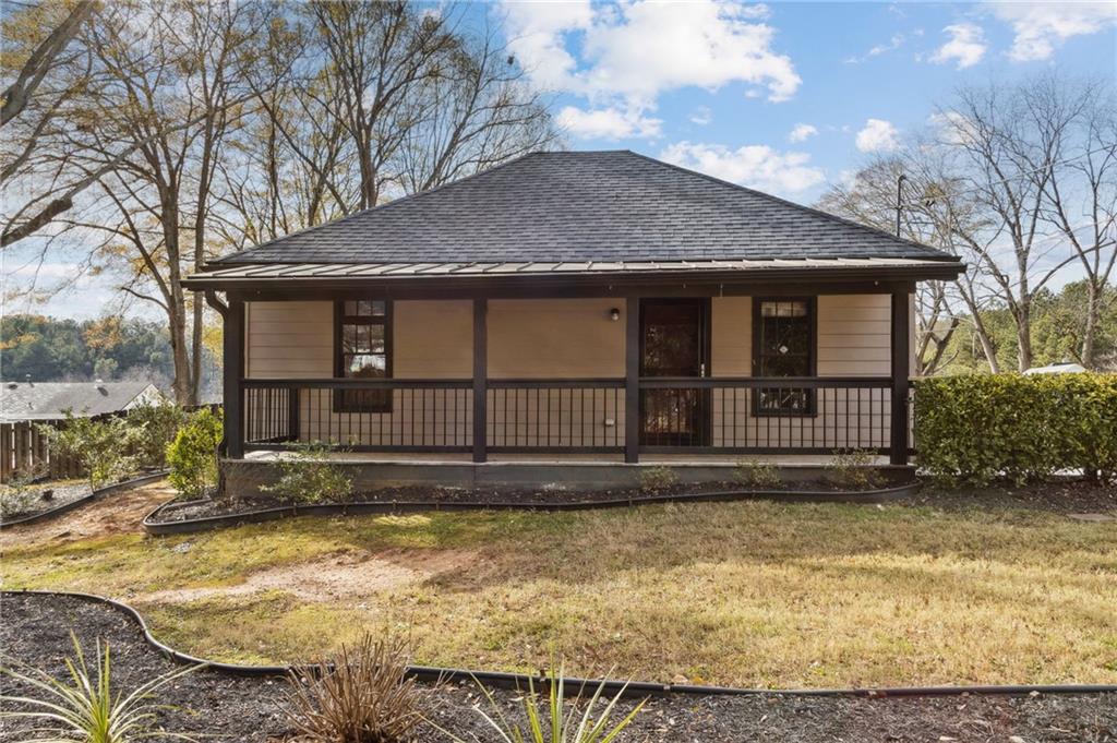 669 Leather Street Buford, GA 30518 - Photo 1 of 46 a view of a house with a yard