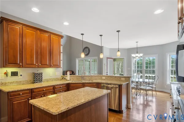 a kitchen with a stove and cabinets