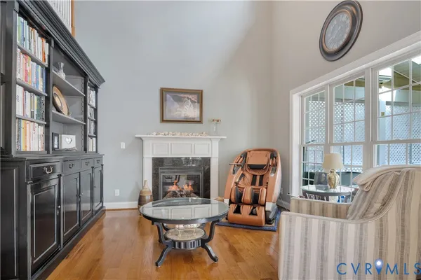 a bed room with a bed and a ceiling fan