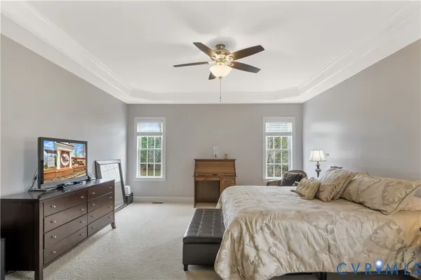 a bathroom with a sink double vanity and a mirror