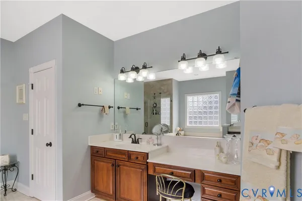 a bathroom with a tub and shower