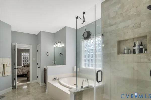 a bathroom with a sink mirror and toilet