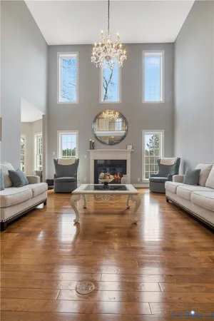 a bathroom with a fireplace and a window
