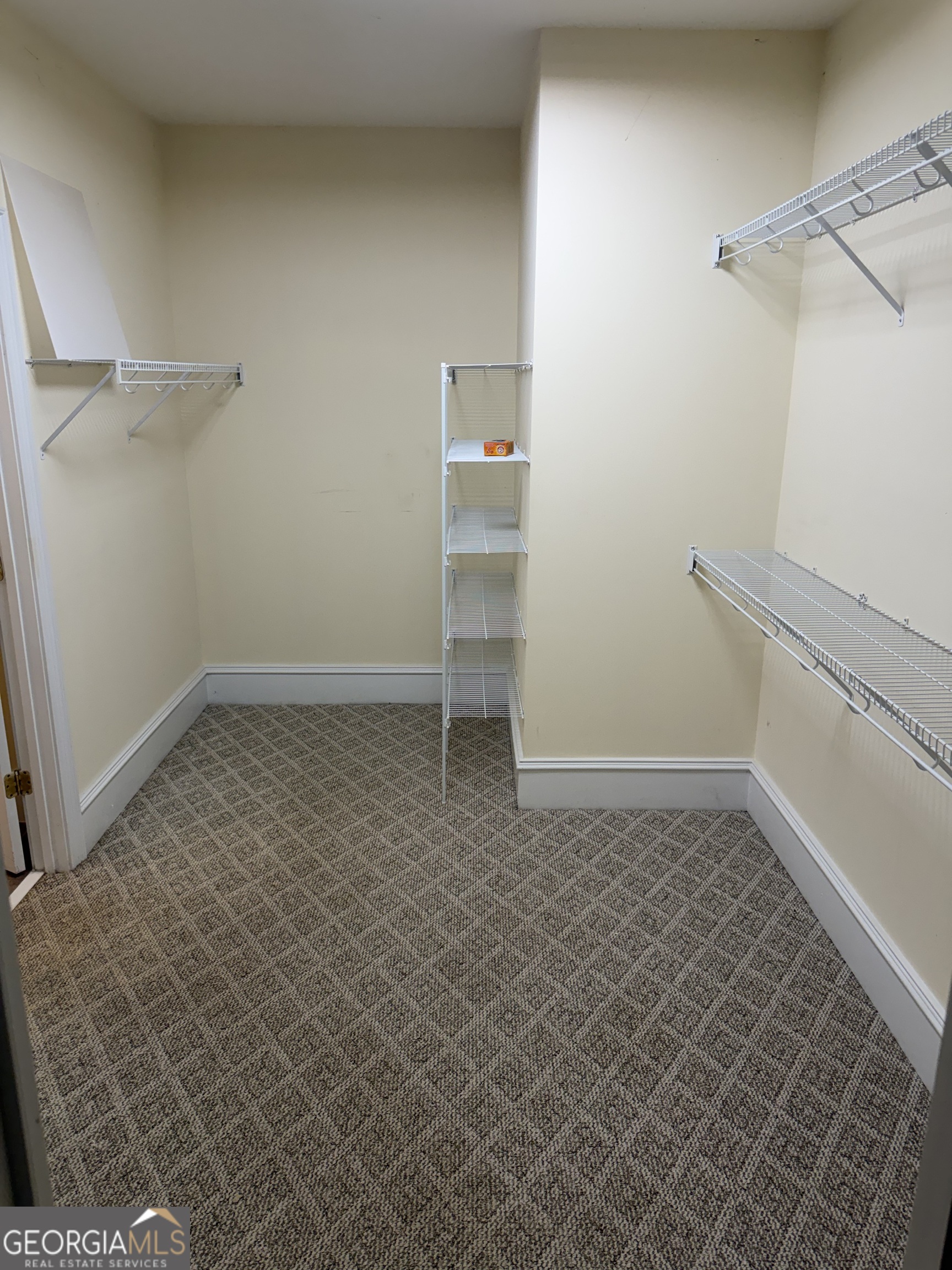 302 Norris Road Barnesville, GA 30204 - Photo 49 of 65 a view of a room with racks on the wall