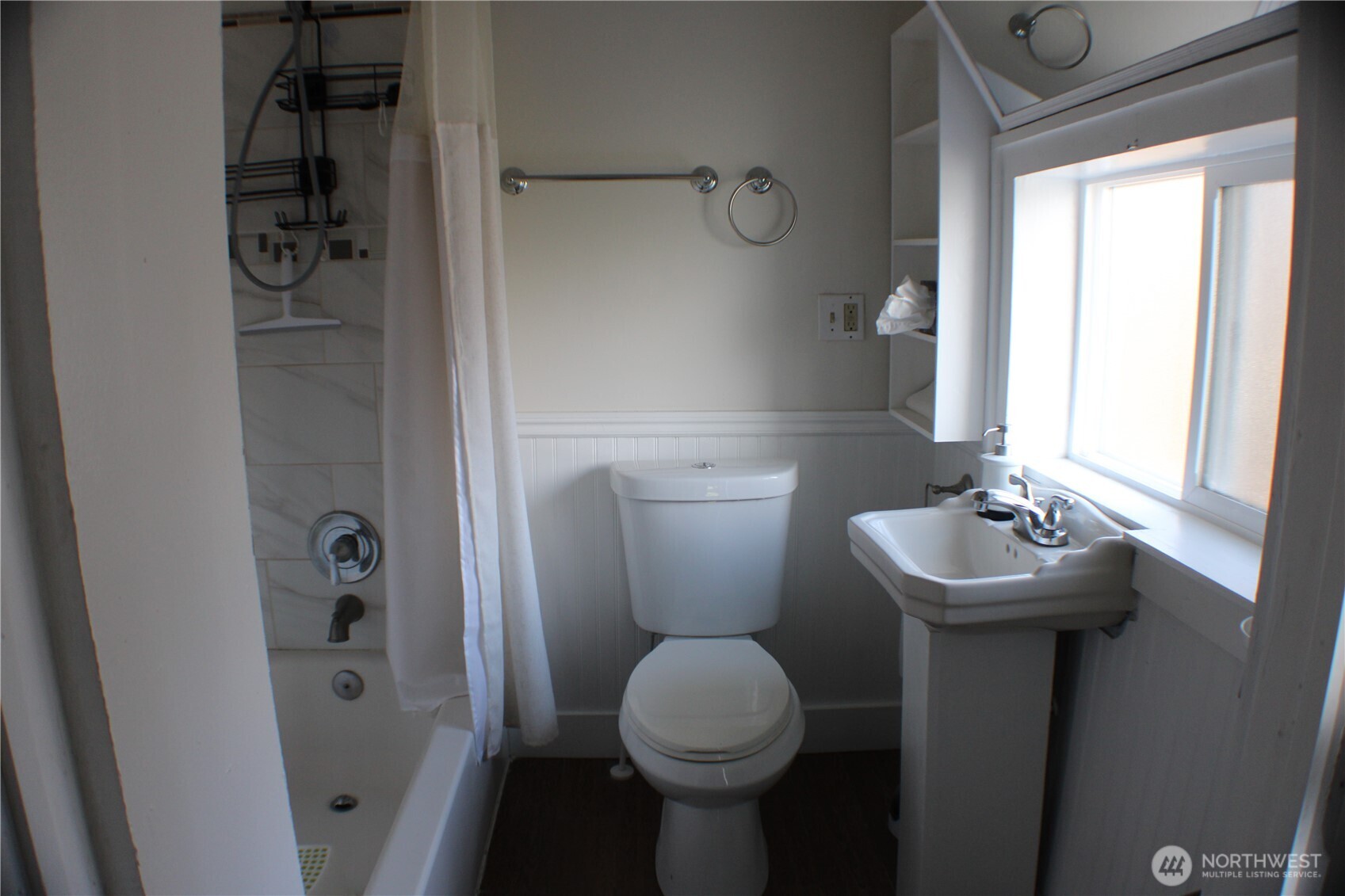 1224 4th Street Cosmopolis, WA 98537 - Photo 17 of 33 a bathroom with a sink toilet and shower