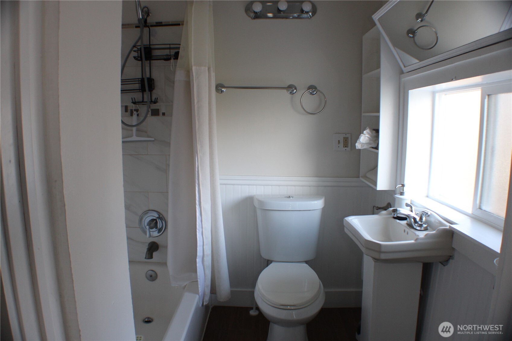 1224 4th Street Cosmopolis, WA 98537 - Photo 18 of 33 a bathroom with a sink toilet and a mirror