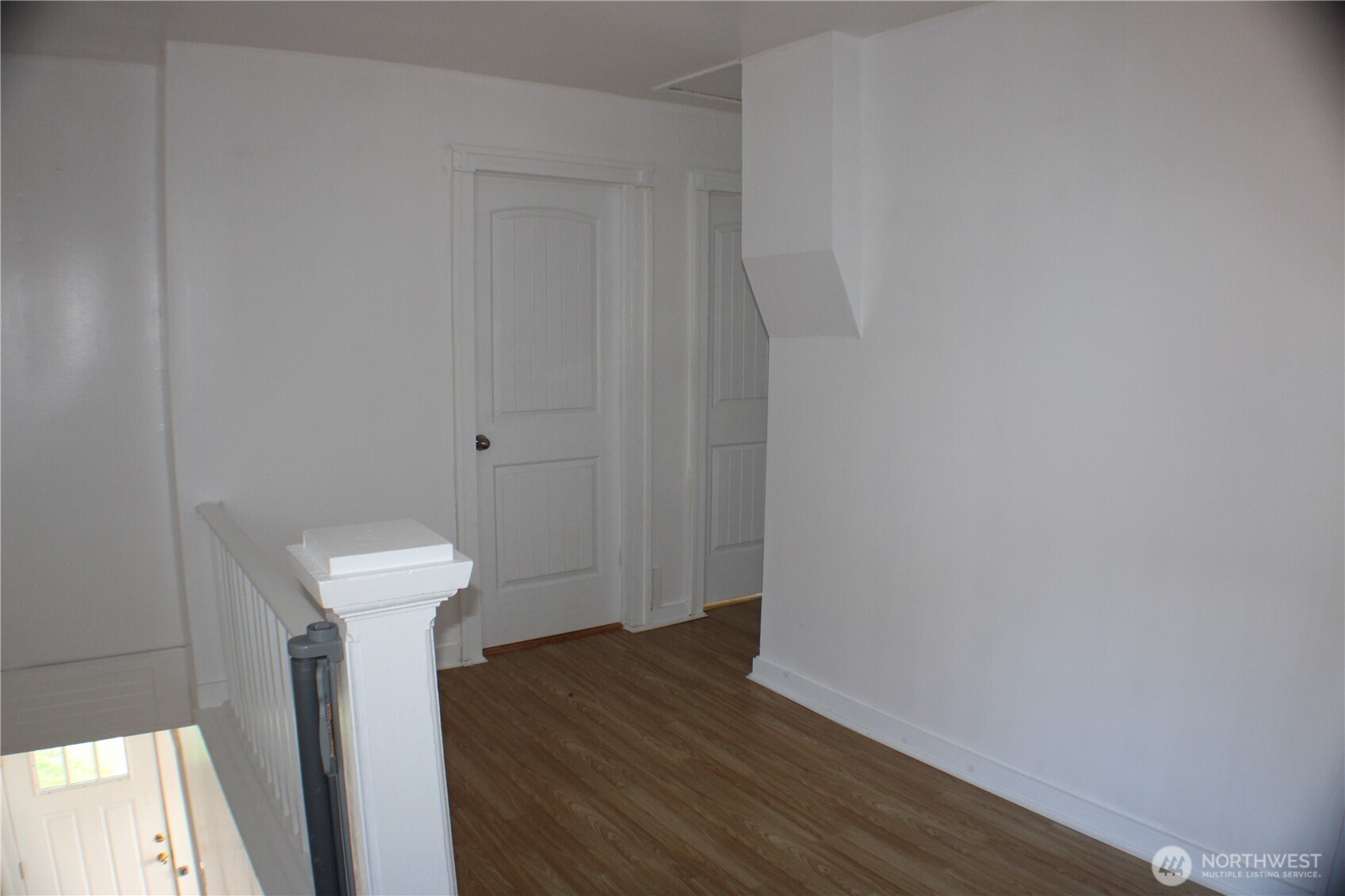 1224 4th Street Cosmopolis, WA 98537 - Photo 19 of 33 a view of a hallway with wooden floor