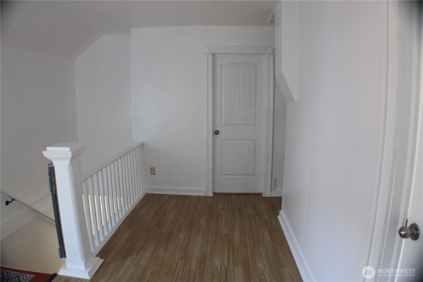 1224 4th Street Cosmopolis, WA 98537 - Photo 20 of 33 a view of a hallway with wooden floor
