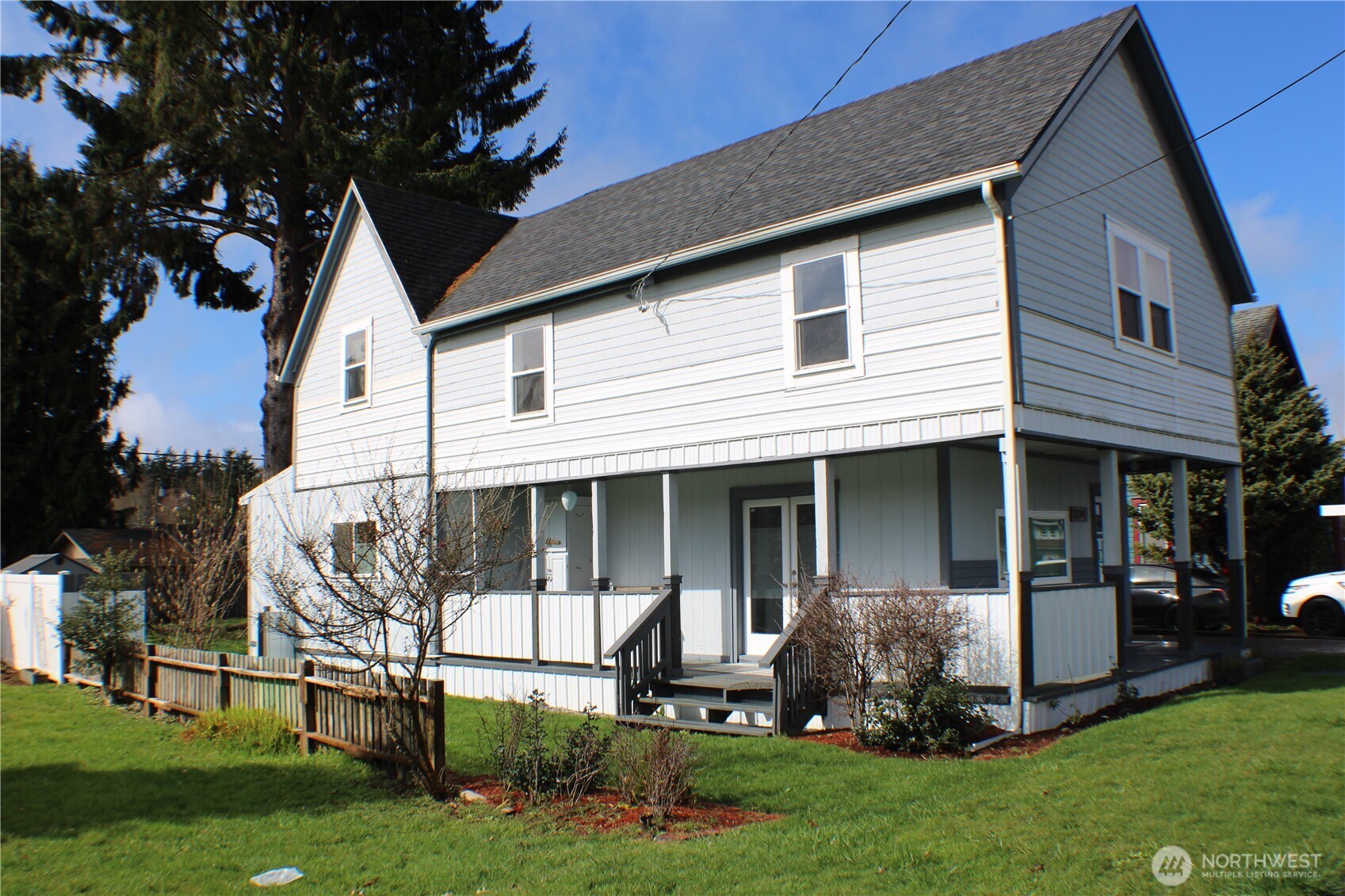 1224 4th Street Cosmopolis, WA 98537 - Photo 2 of 33 a view of front a house with a yard and a large tree