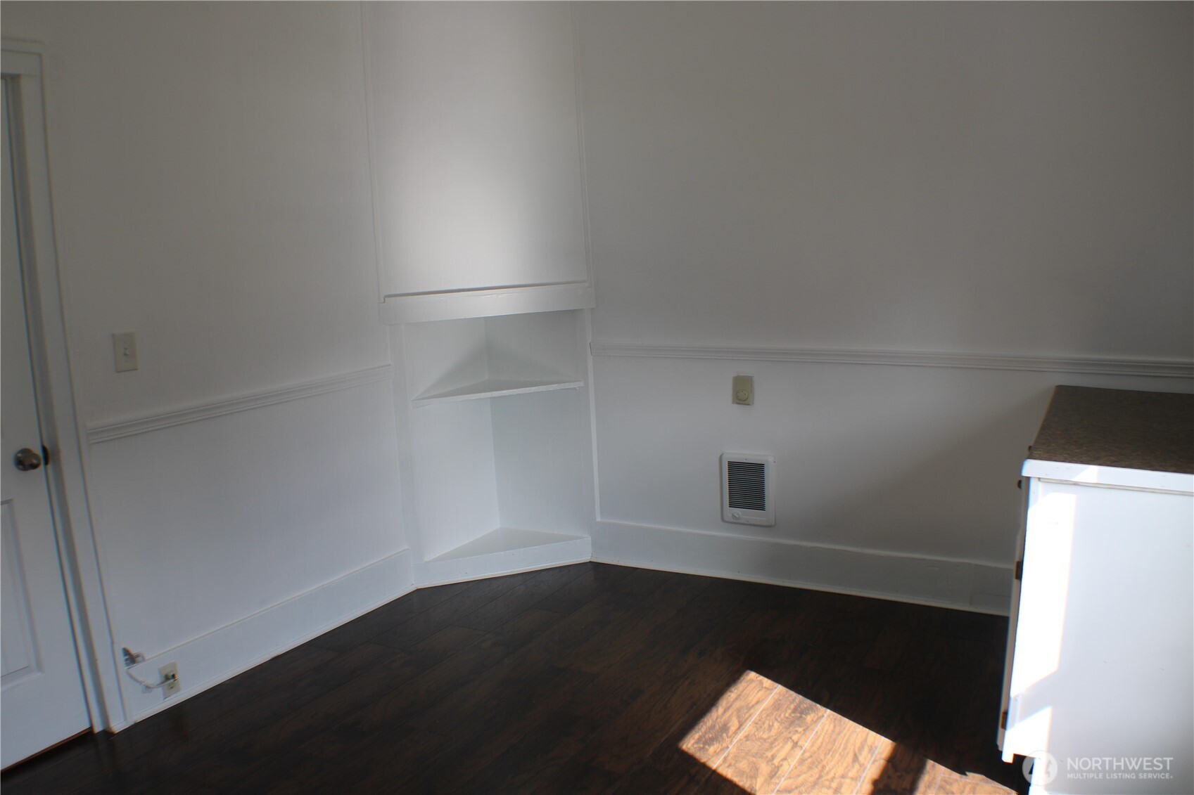 1224 4th Street Cosmopolis, WA 98537 - Photo 25 of 33 an empty room with wooden floor and windows