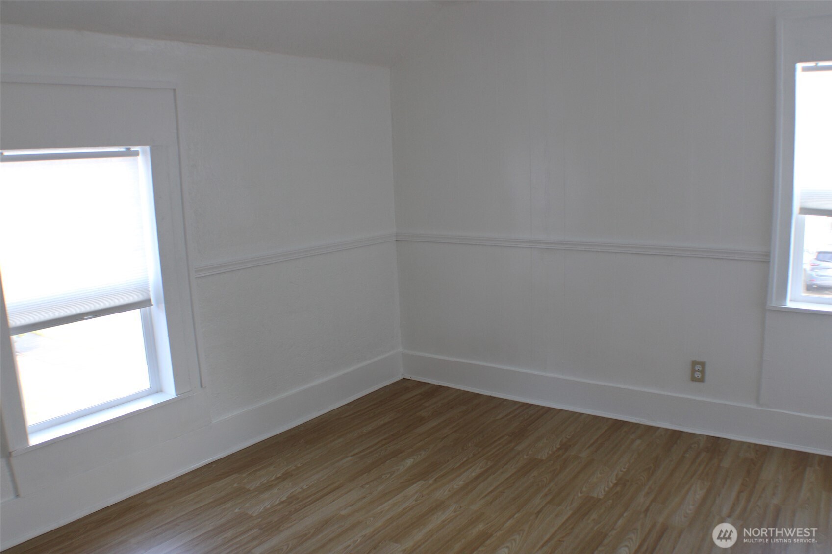 1224 4th Street Cosmopolis, WA 98537 - Photo 26 of 33 a view of a small space with wooden floor and a window