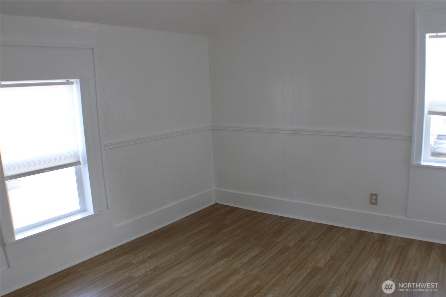 1224 4th Street Cosmopolis, WA 98537 - Photo 27 of 33 a view of a small space with wooden floor and a window