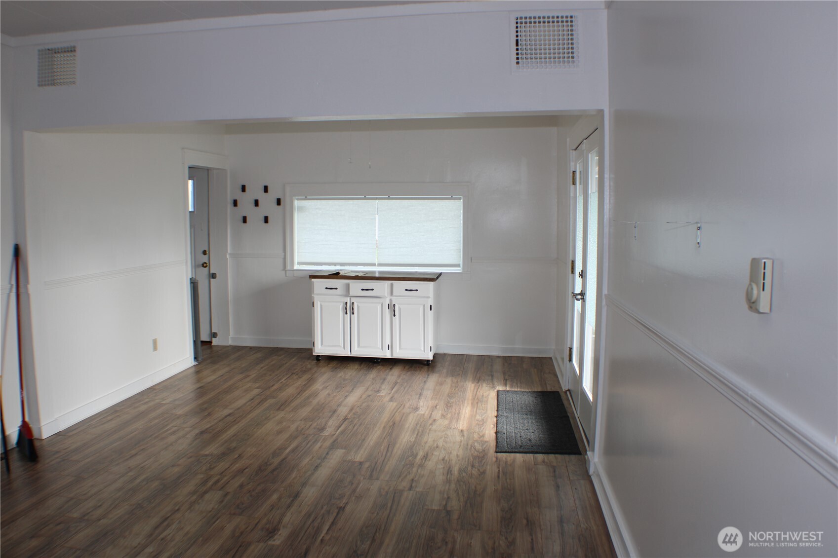 1224 4th Street Cosmopolis, WA 98537 - Photo 8 of 33 a view of a kitchen with wooden floor and electronic appliances