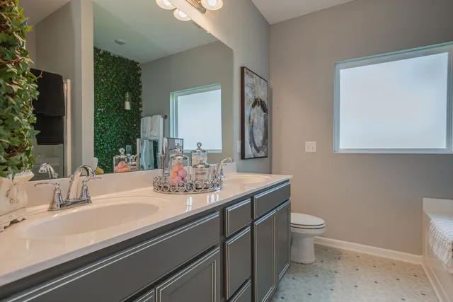 a room with a bed and a window