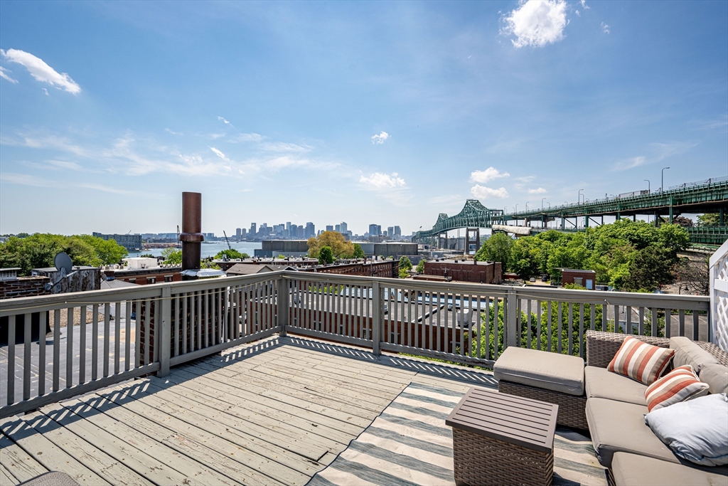 54 Beacon Street, Unit 2 Chelsea, MA 02150 - Photo 23 of 26 a view of a balcony with furniture