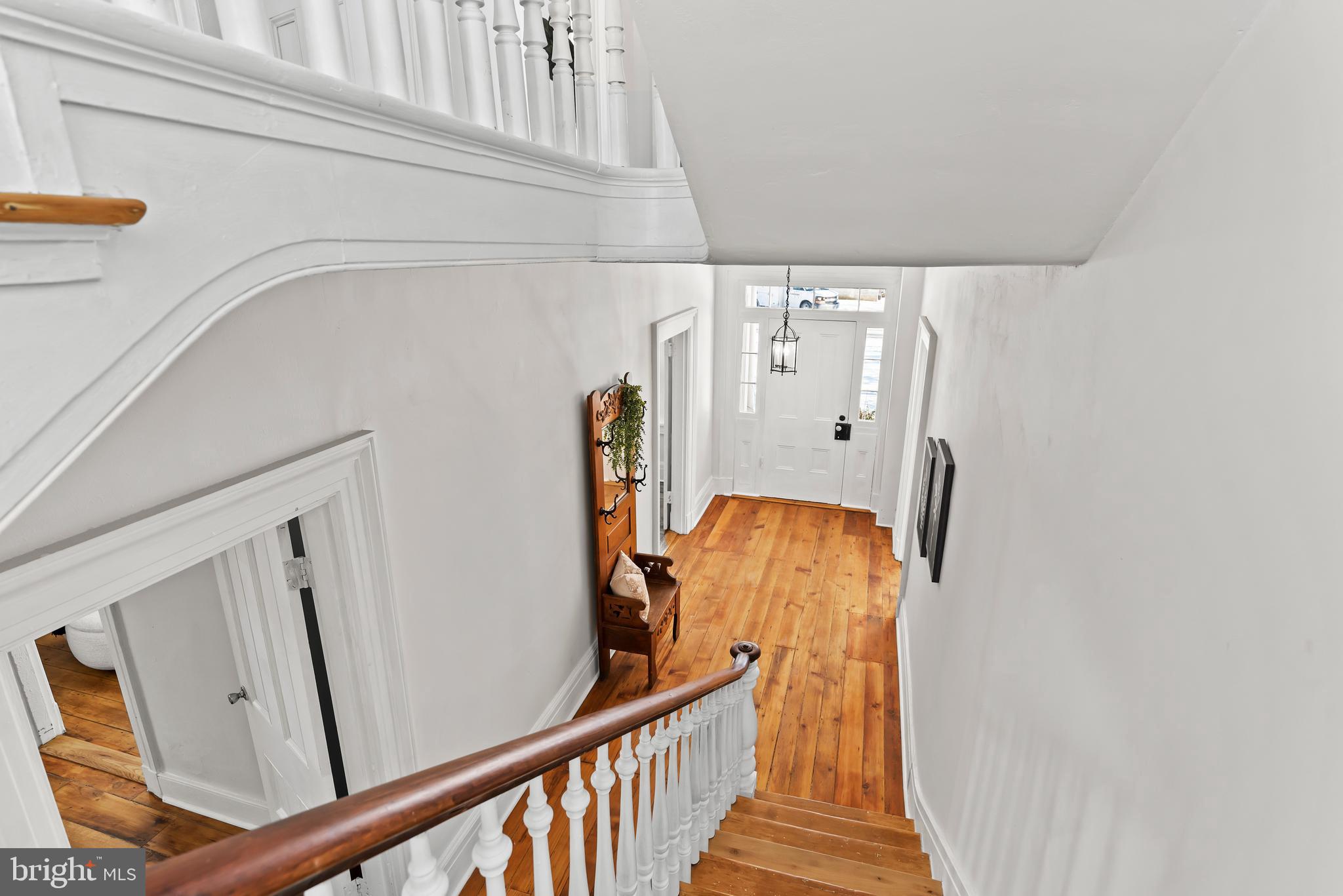 320 South Middlesex Road Carlisle, PA 17015 - Photo 25 of 66 a view of a hallway with wooden floor and staircase