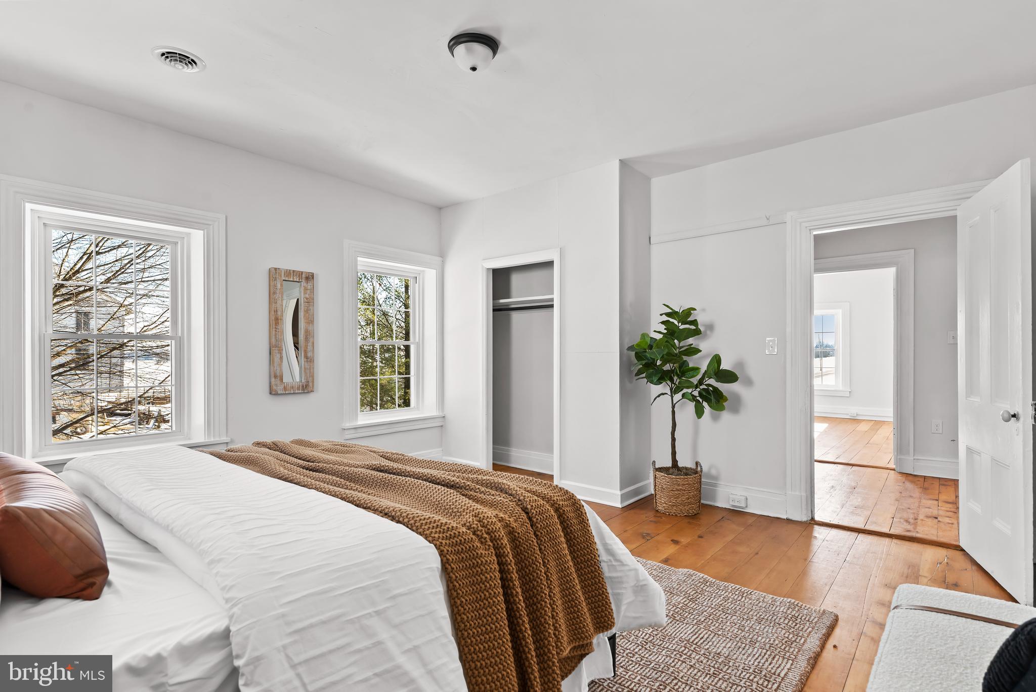 320 South Middlesex Road Carlisle, PA 17015 - Photo 27 of 66 a bedroom with a bed and a potted plant