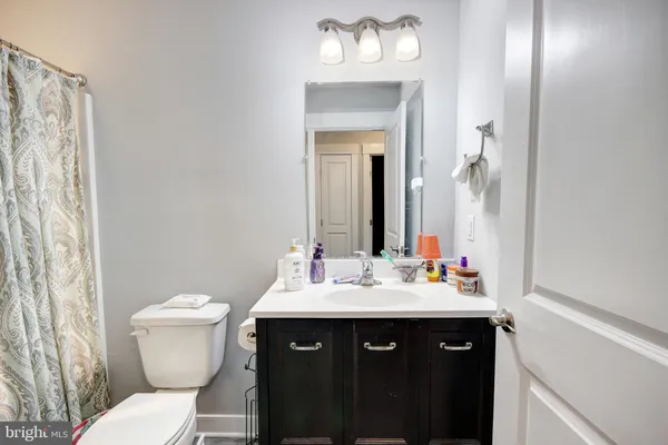 a bathroom with a sink and a toilet