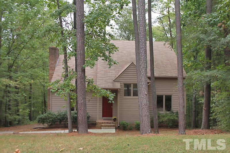 27 Sandstone Ridge Drive Durham, NC 27713 - Photo 1 of 12 a view of a house with a backyard