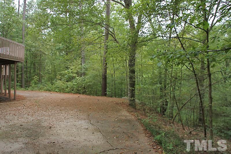 27 Sandstone Ridge Drive Durham, NC 27713 - Photo 11 of 12 a view of a house with a tree