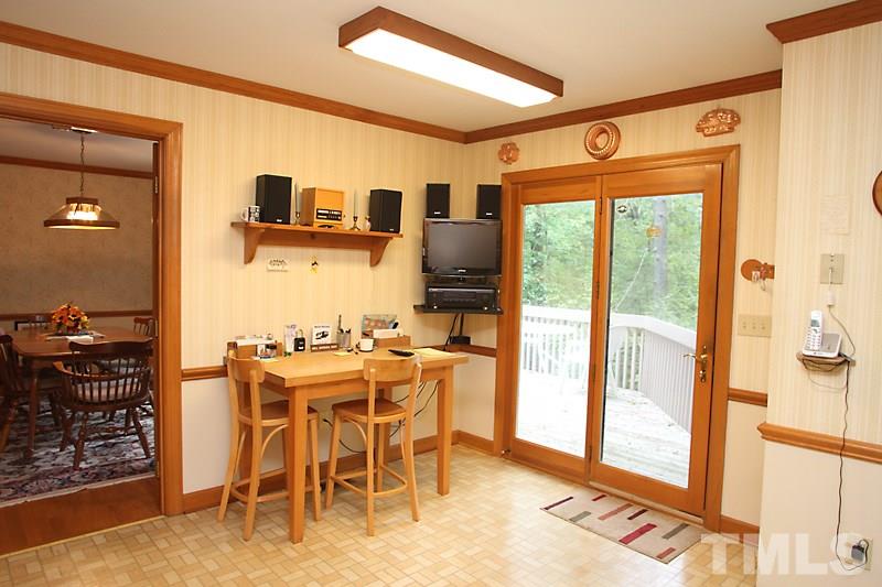 27 Sandstone Ridge Drive Durham, NC 27713 - Photo 5 of 12 a view of a dining room with furniture window and outside view
