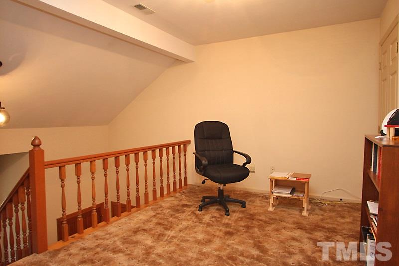 27 Sandstone Ridge Drive Durham, NC 27713 - Photo 9 of 12 a view of a chairs and table in a balcony