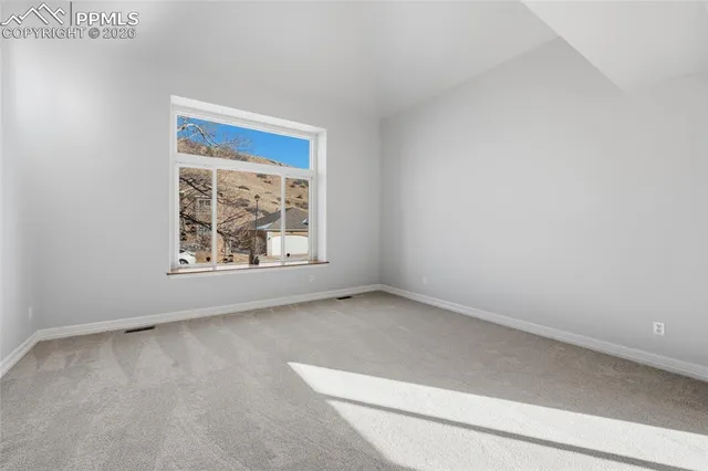 an empty room with windows