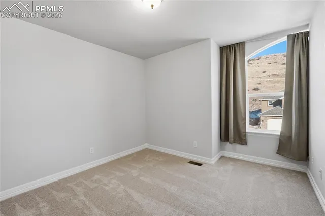 an empty room with a window