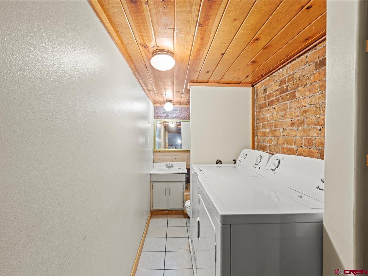 726 Main Street Ouray, CO 81427 - Photo 17 of 41 a utility room with dryer and washer