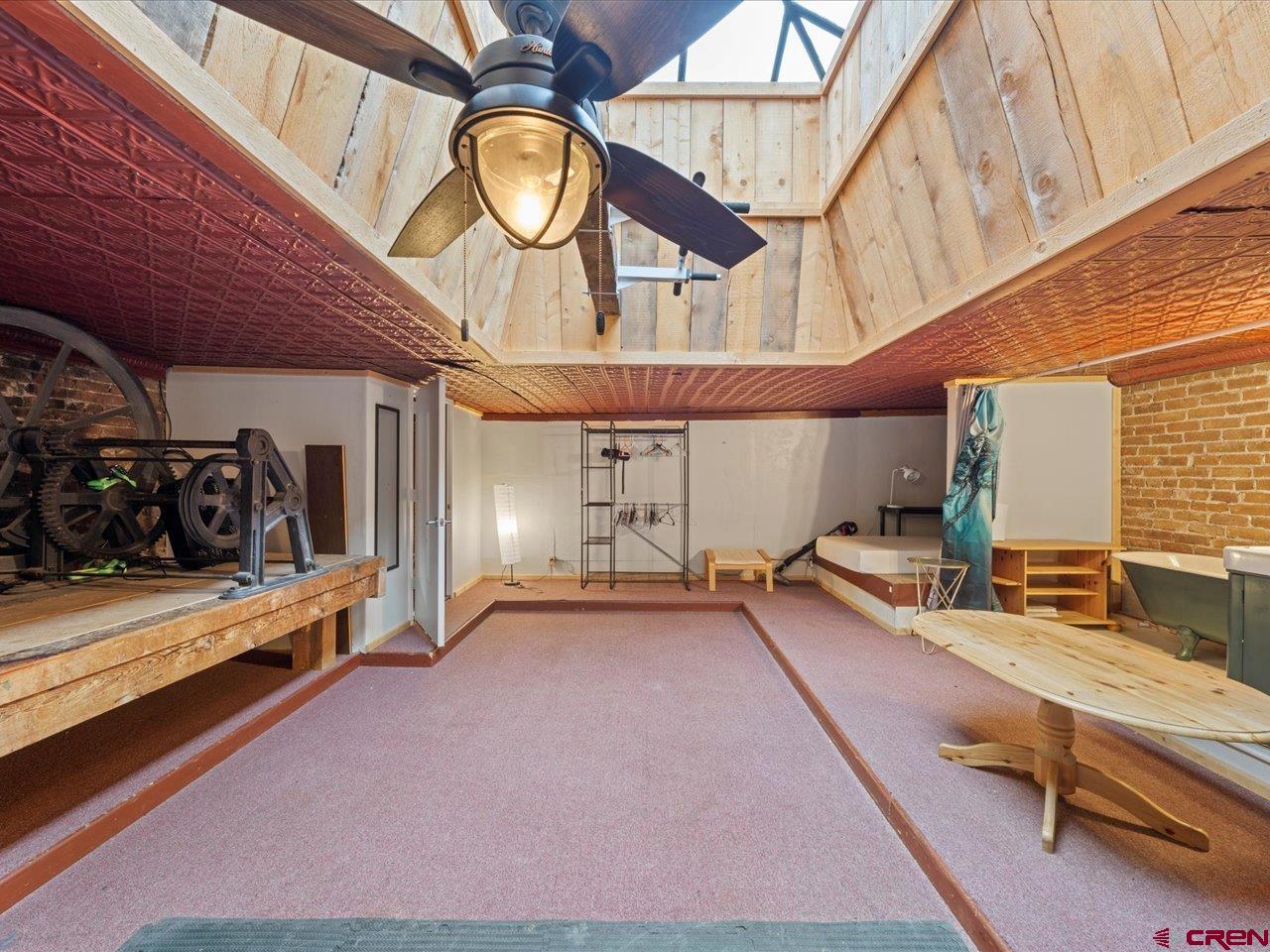 726 Main Street Ouray, CO 81427 - Photo 24 of 41 a view of a room with gym equipment