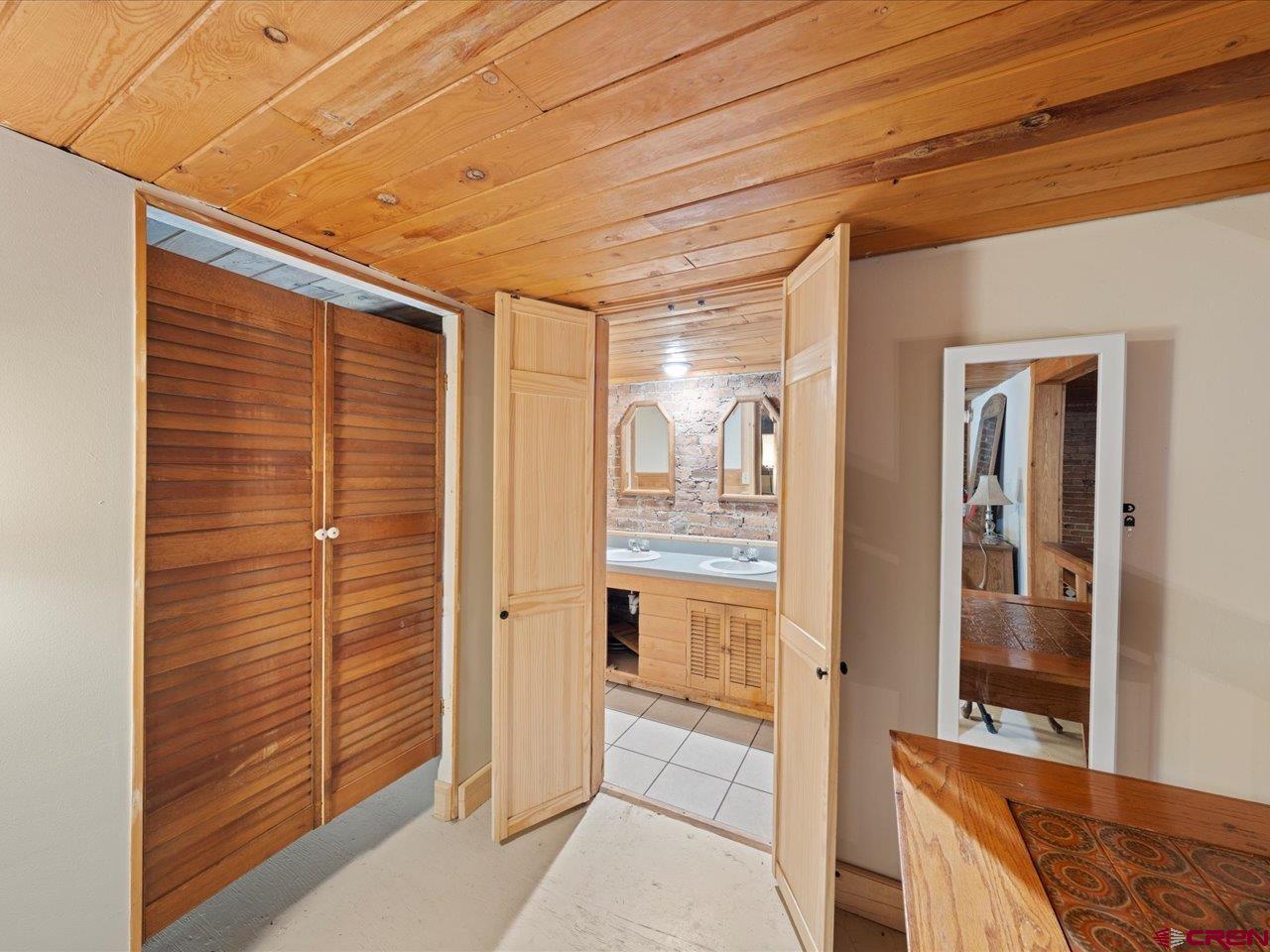 726 Main Street Ouray, CO 81427 - Photo 27 of 41 a bathroom with a tub and shower