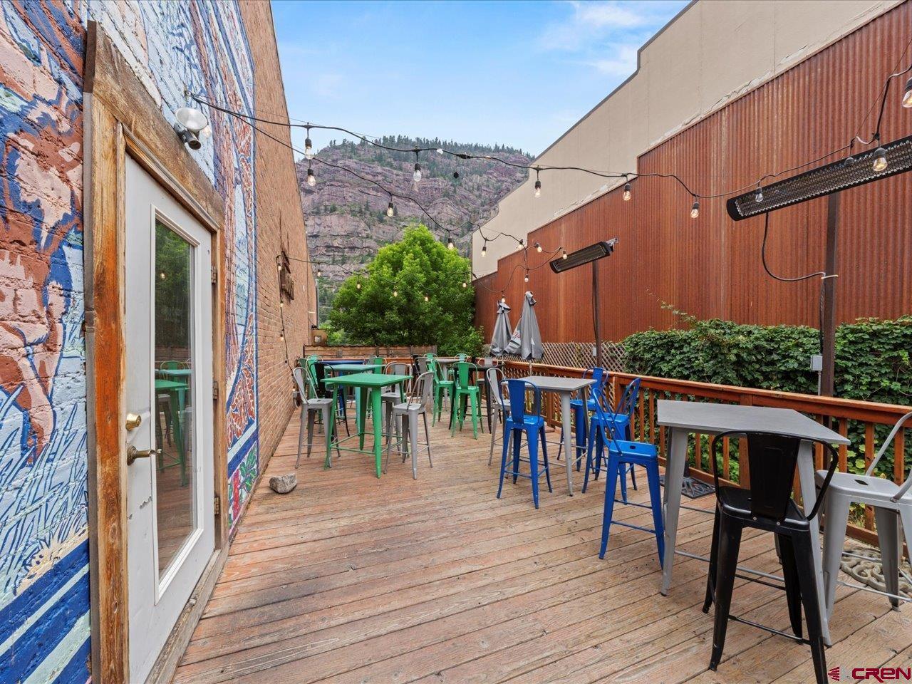 726 Main Street Ouray, CO 81427 - Photo 3 of 41 a view of a chairs and table in the balcony
