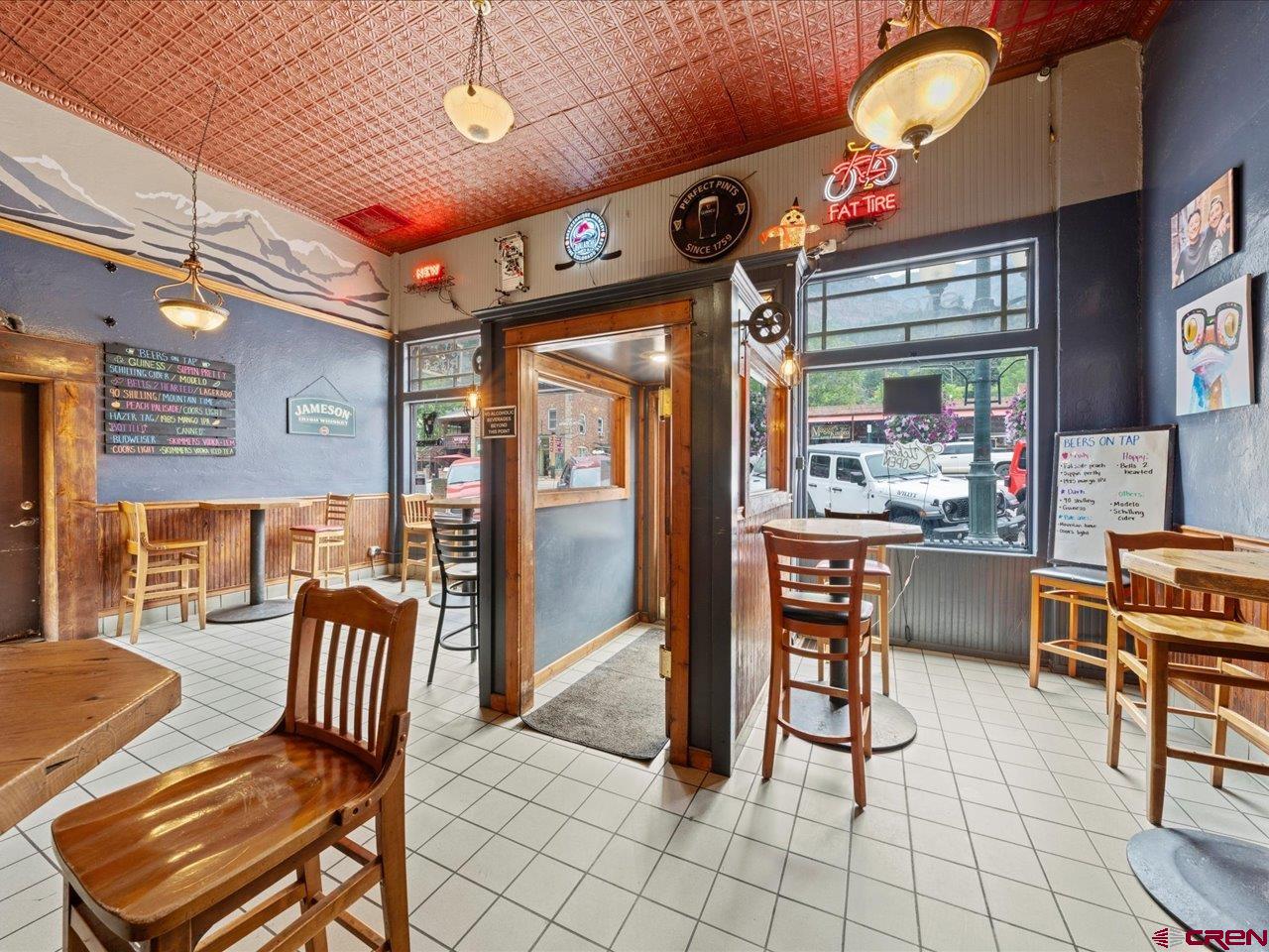 726 Main Street Ouray, CO 81427 - Photo 6 of 41 a view of a dining area with furniture