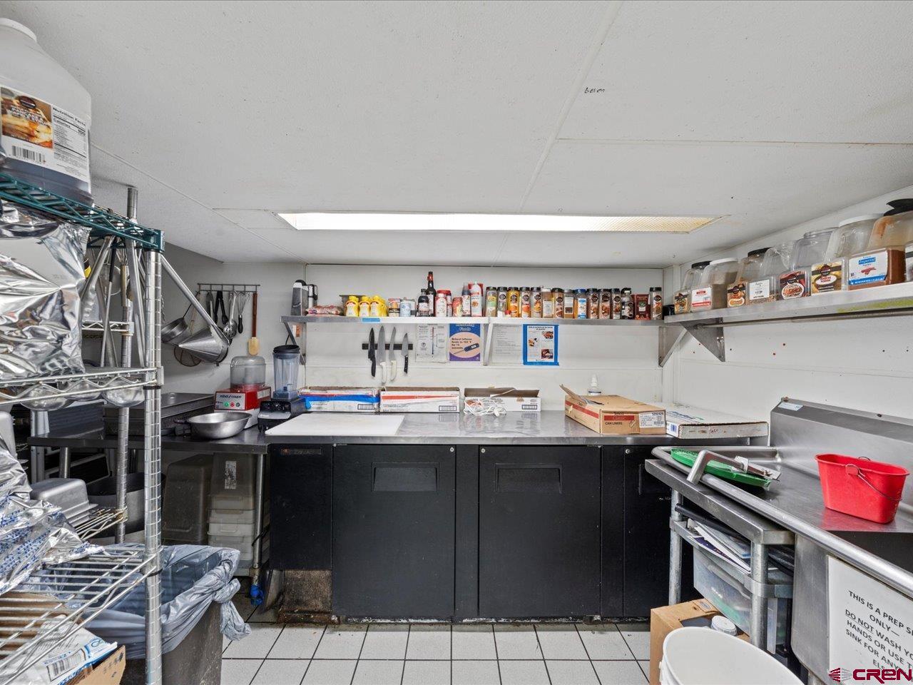 726 Main Street Ouray, CO 81427 - Photo 10 of 41 a kitchen with a sink and cabinets
