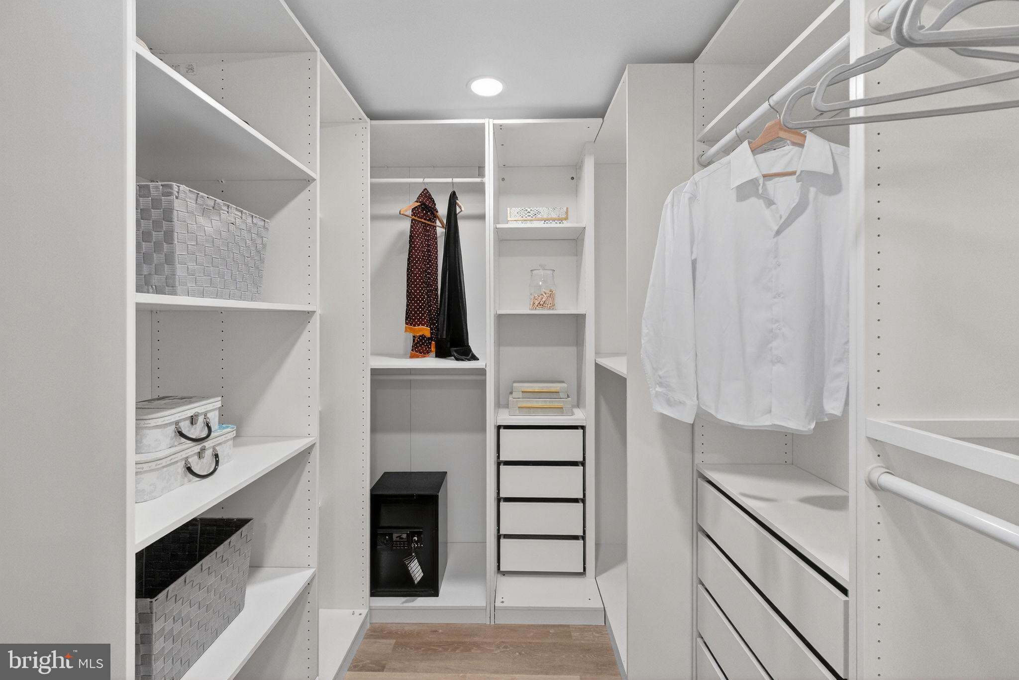 3151 Newton Street Northeast Washington, DC 20018 - Photo 18 of 49 a view of walk in closet with clothes and shoes