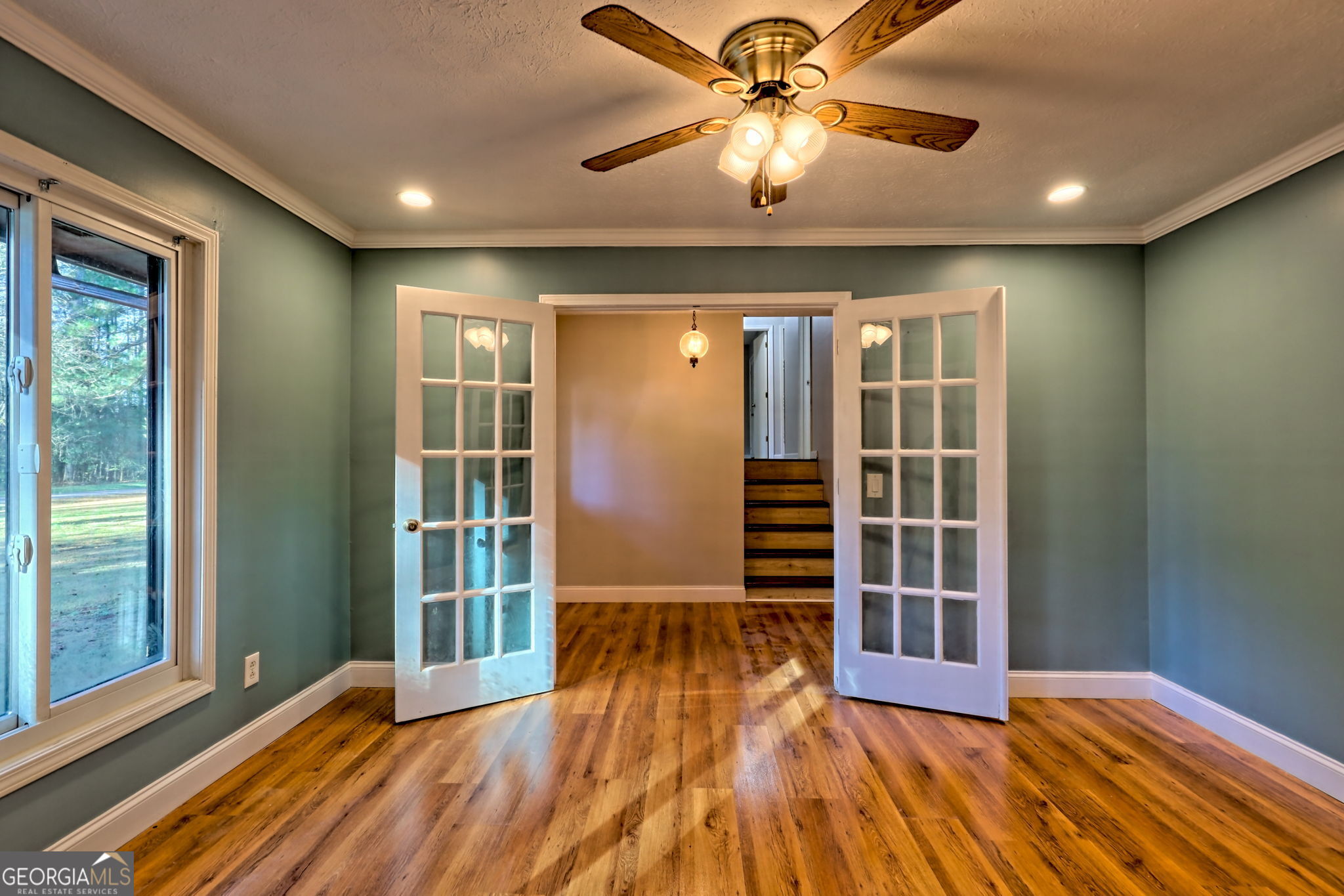 588 Estatohe Circle Toccoa, GA 30577 - Photo 11 of 71 wooden floor in an empty room with a window