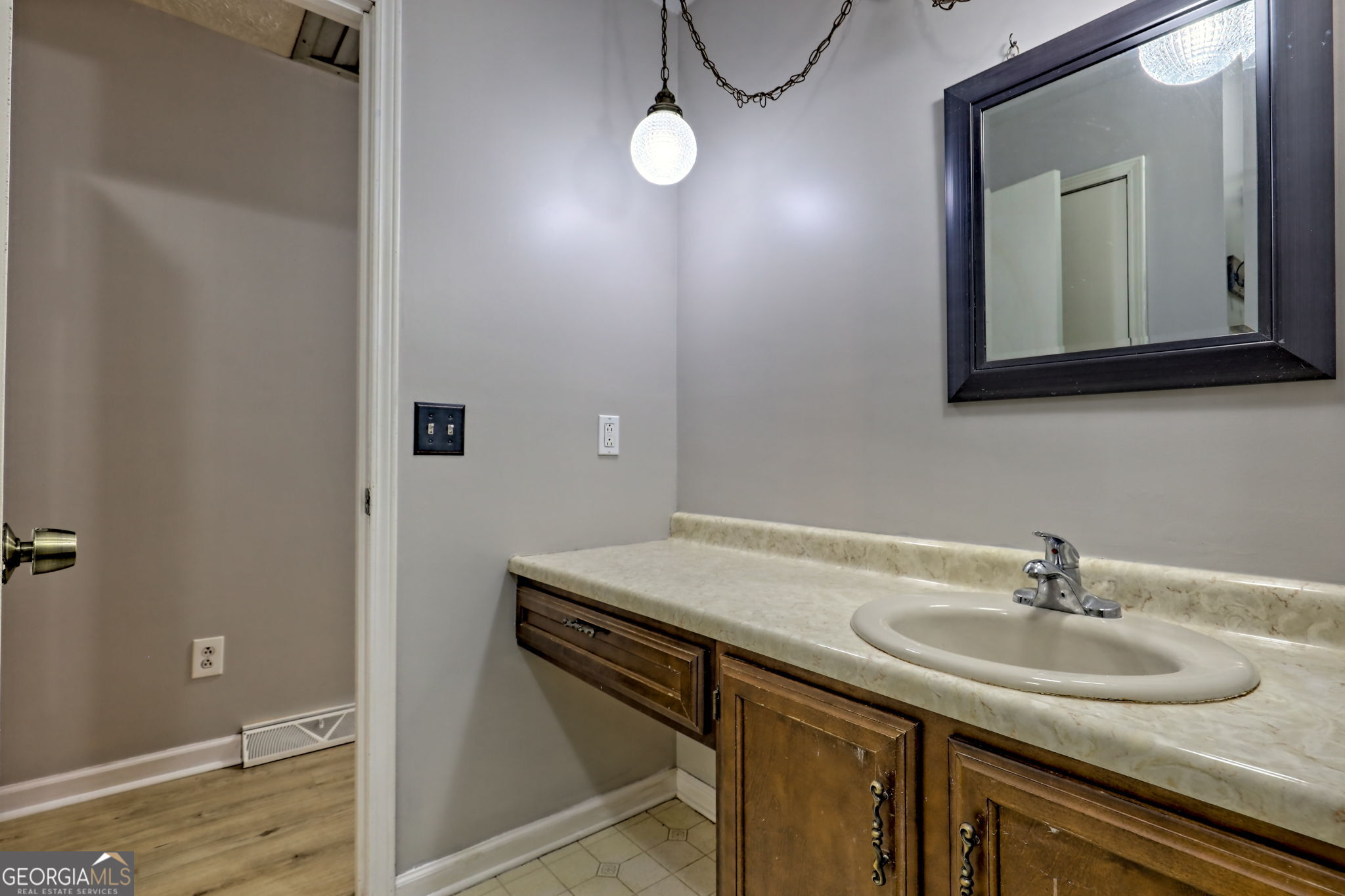 588 Estatohe Circle Toccoa, GA 30577 - Photo 22 of 71 a bathroom with a sink and a mirror