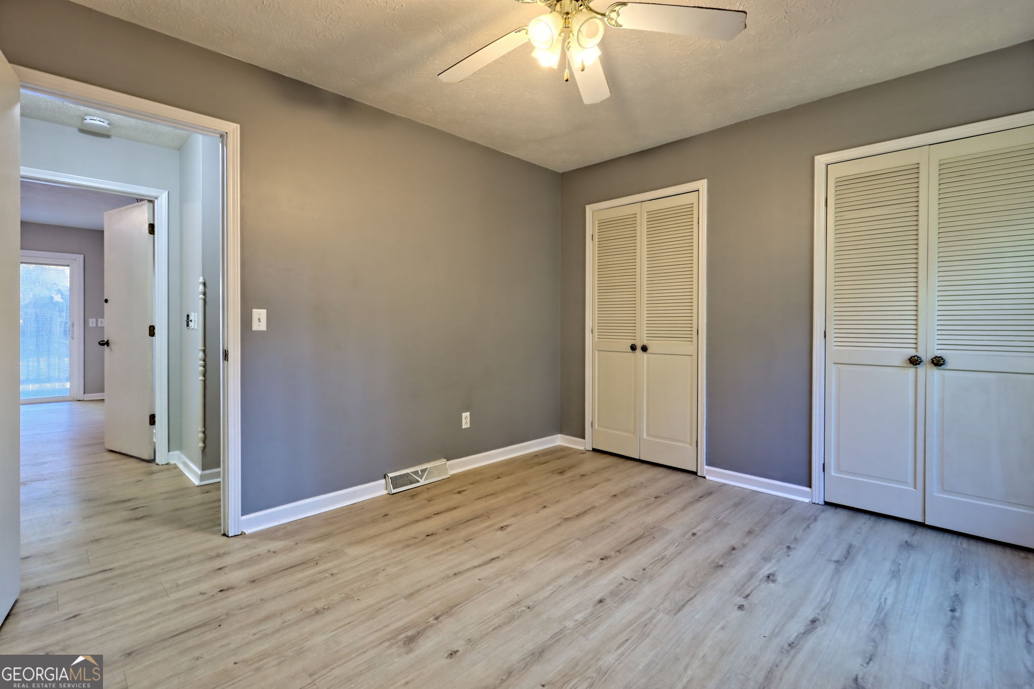 588 Estatohe Circle Toccoa, GA 30577 - Photo 25 of 71 a view of an empty room with wooden floor
