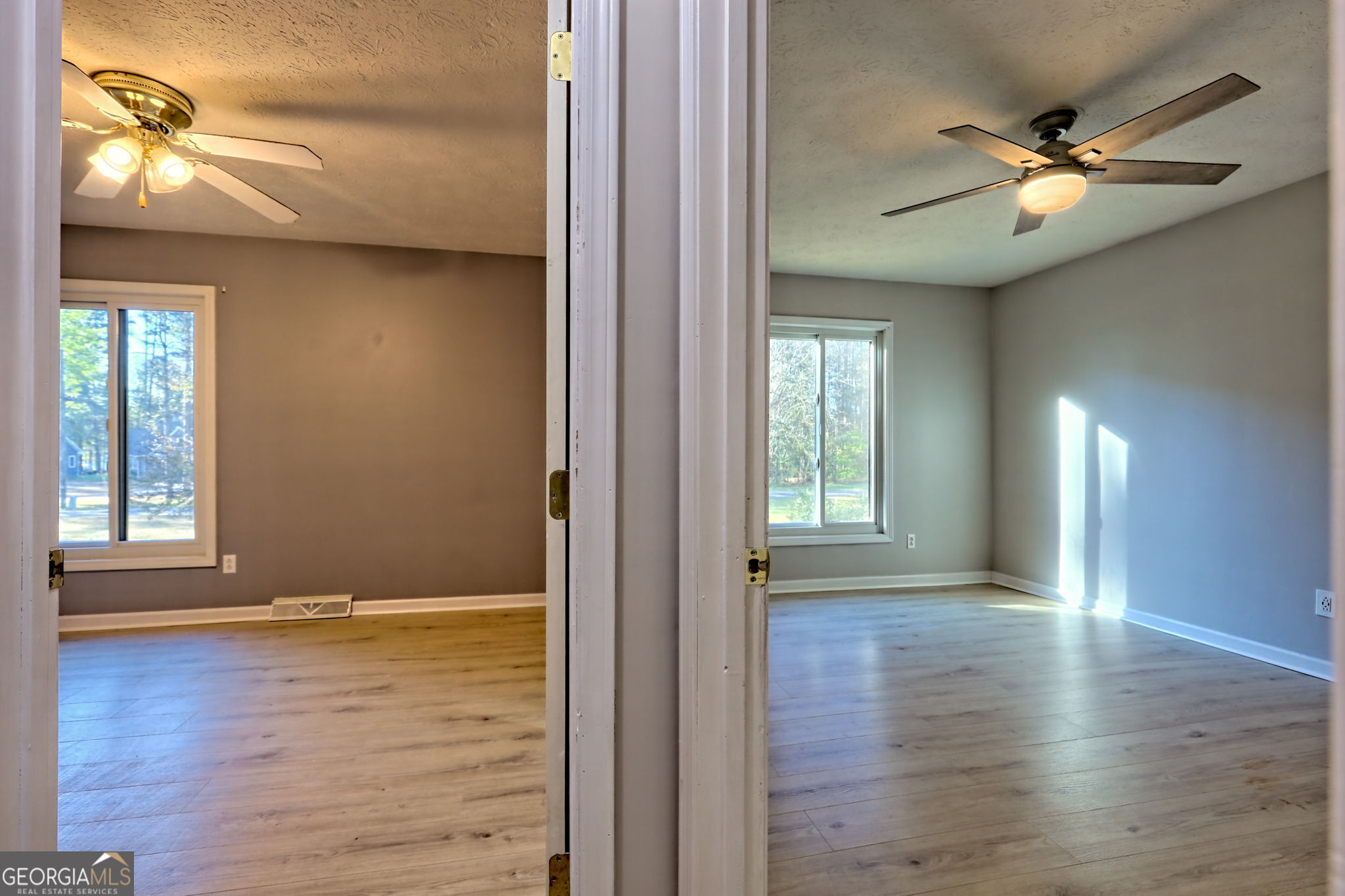 588 Estatohe Circle Toccoa, GA 30577 - Photo 26 of 71 a view of an empty room with window and wooden floor