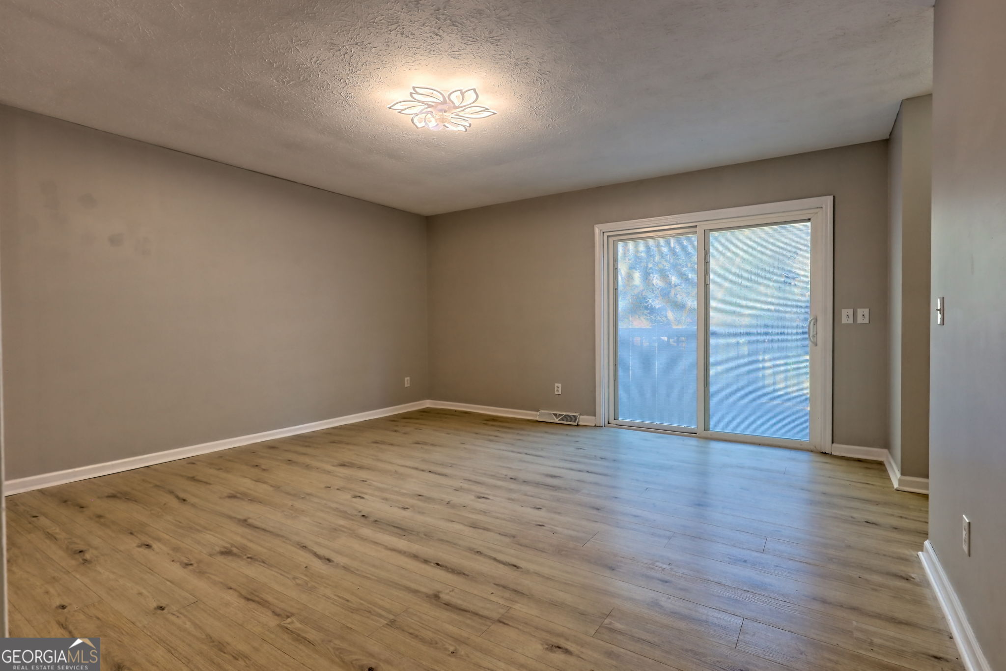 588 Estatohe Circle Toccoa, GA 30577 - Photo 30 of 71 a view of an empty room and wooden floor