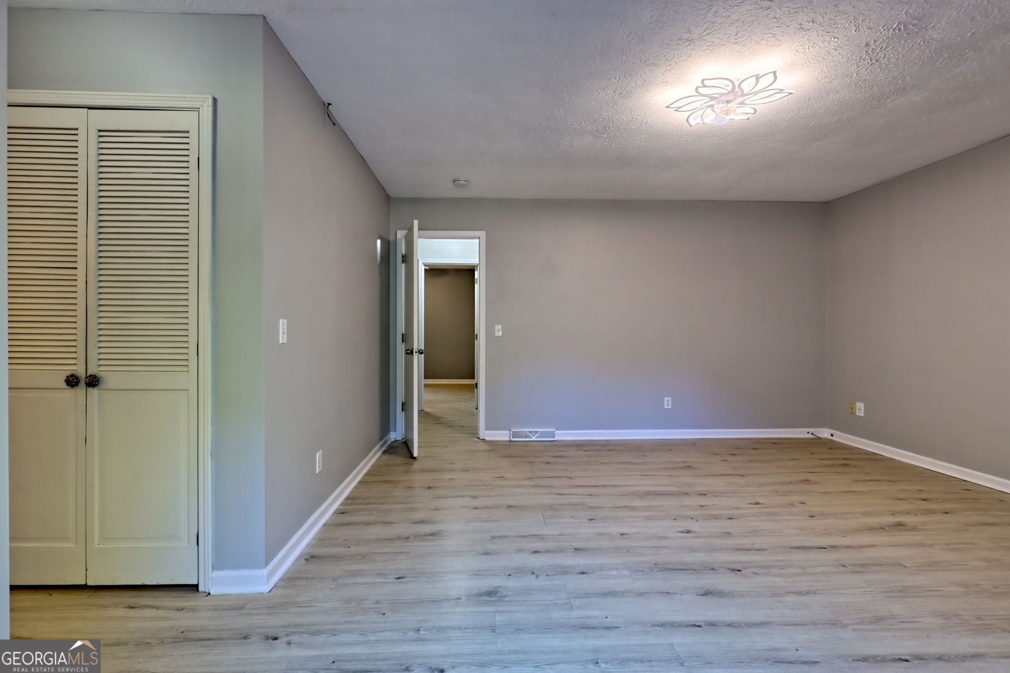 588 Estatohe Circle Toccoa, GA 30577 - Photo 32 of 71 a view of empty room with wooden floor