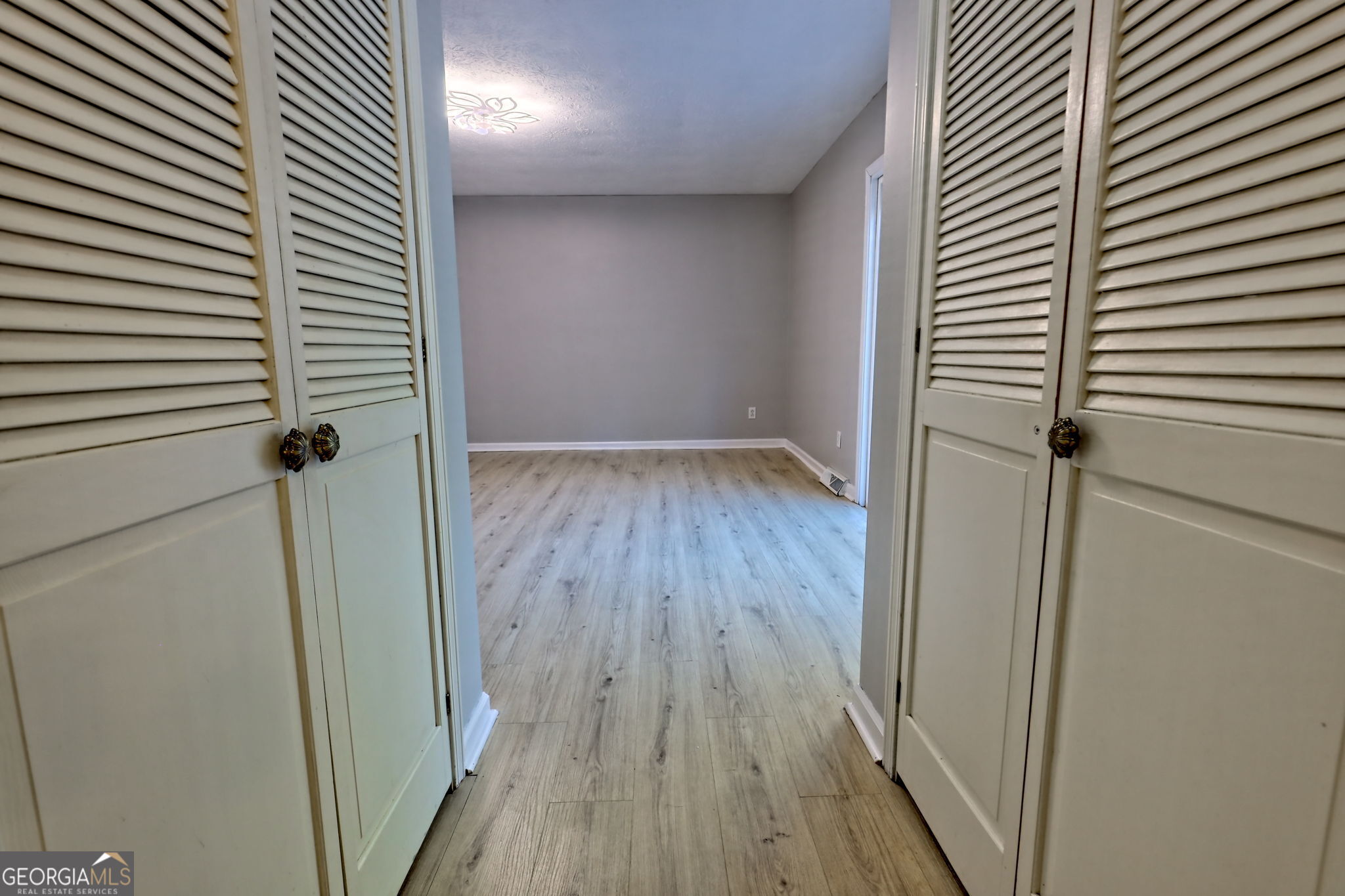 588 Estatohe Circle Toccoa, GA 30577 - Photo 33 of 71 a view of a hallway with wooden floor