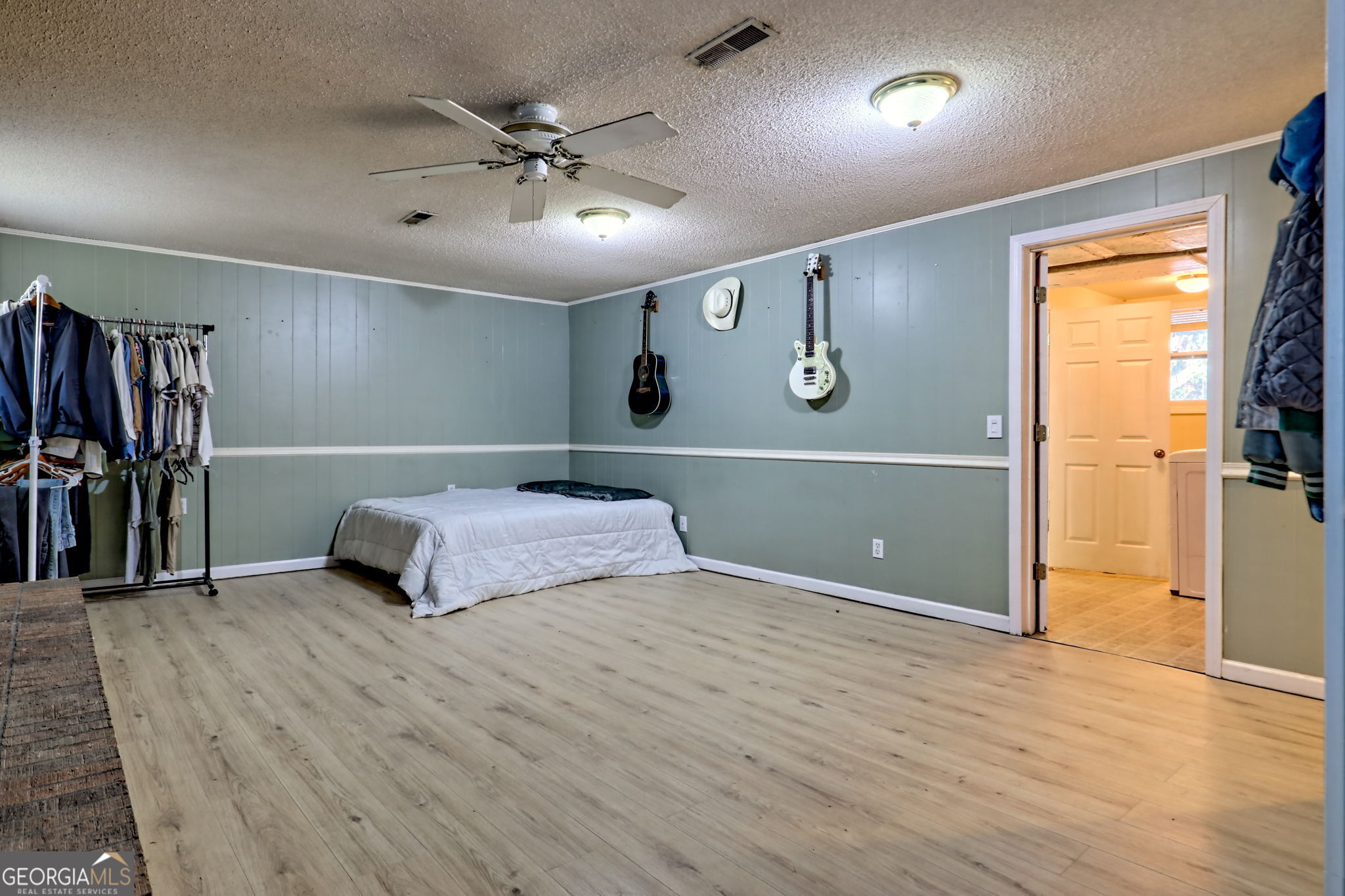 588 Estatohe Circle Toccoa, GA 30577 - Photo 45 of 71 a bedroom with a bed and a ceiling fan