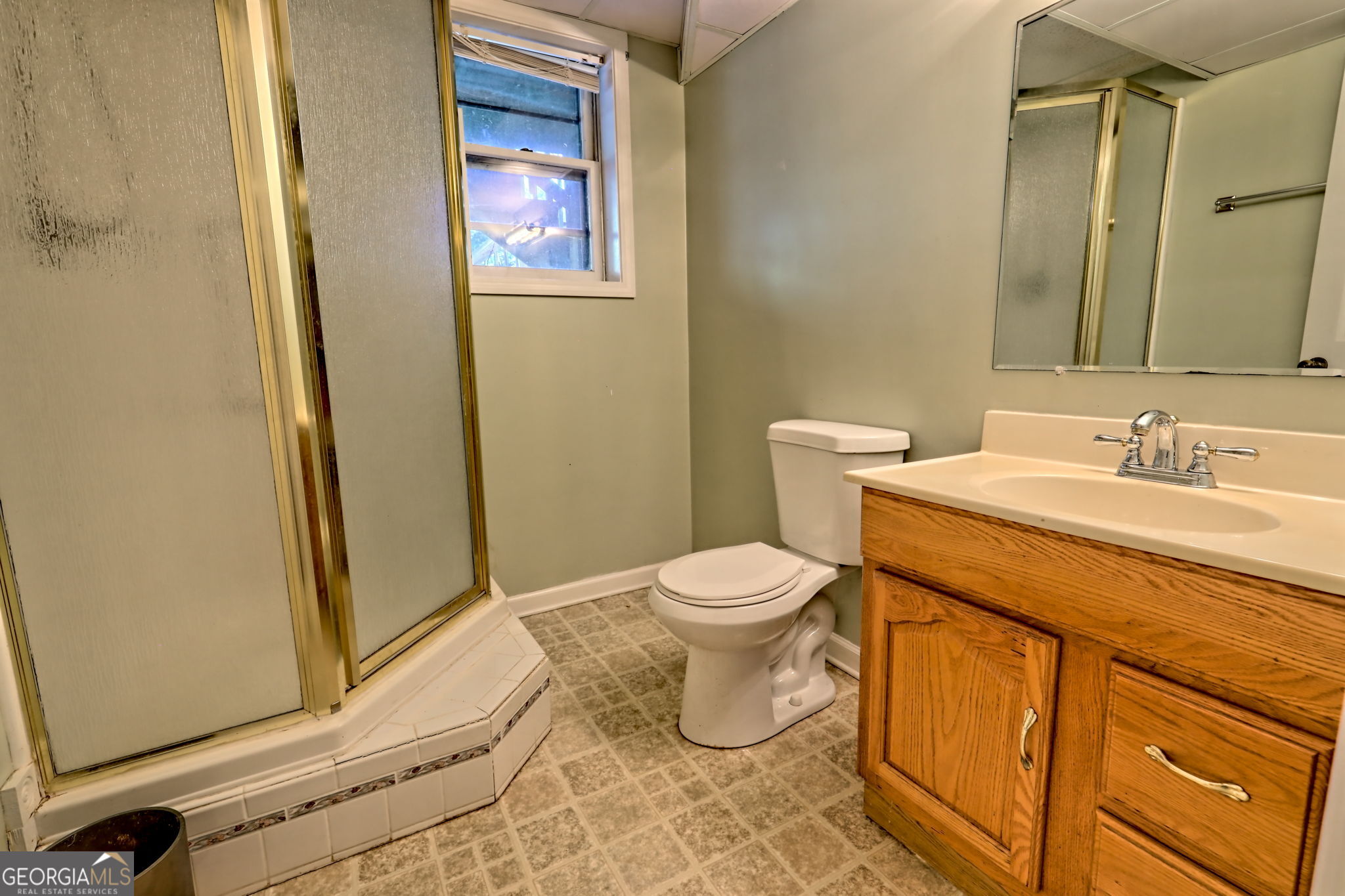 588 Estatohe Circle Toccoa, GA 30577 - Photo 48 of 71 a spacious bathroom with a granite countertop toilet and a sink