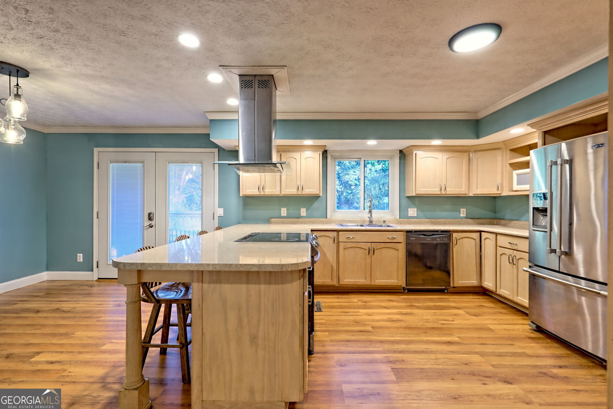 588 Estatohe Circle Toccoa, GA 30577 - Photo 6 of 71 a kitchen with stainless steel appliances granite countertop a sink a stove and a refrigerator