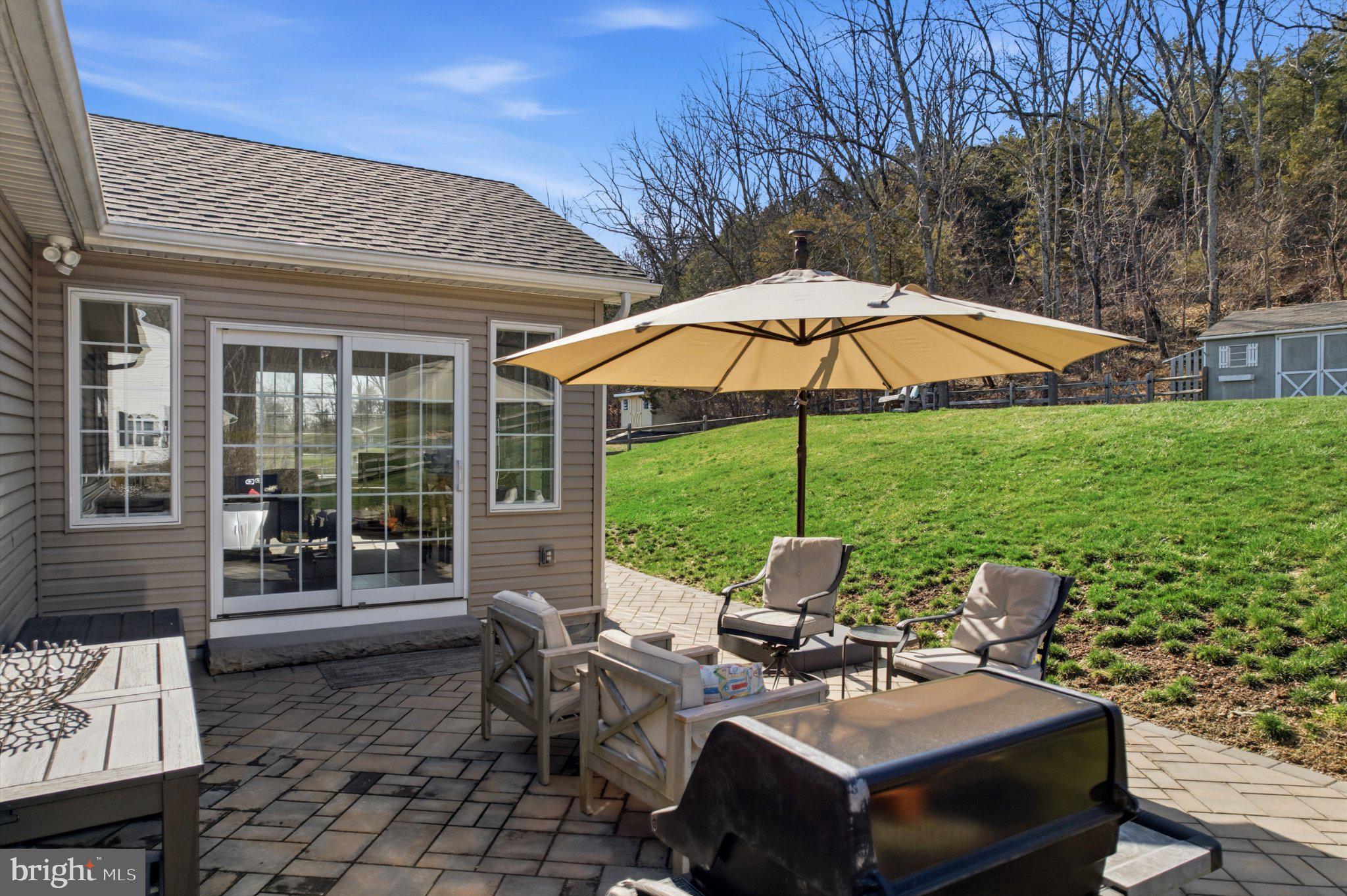 4315 Barndt Road Telford, PA 18969 - Photo 14 of 43 Sunny patio with inviting greenery.