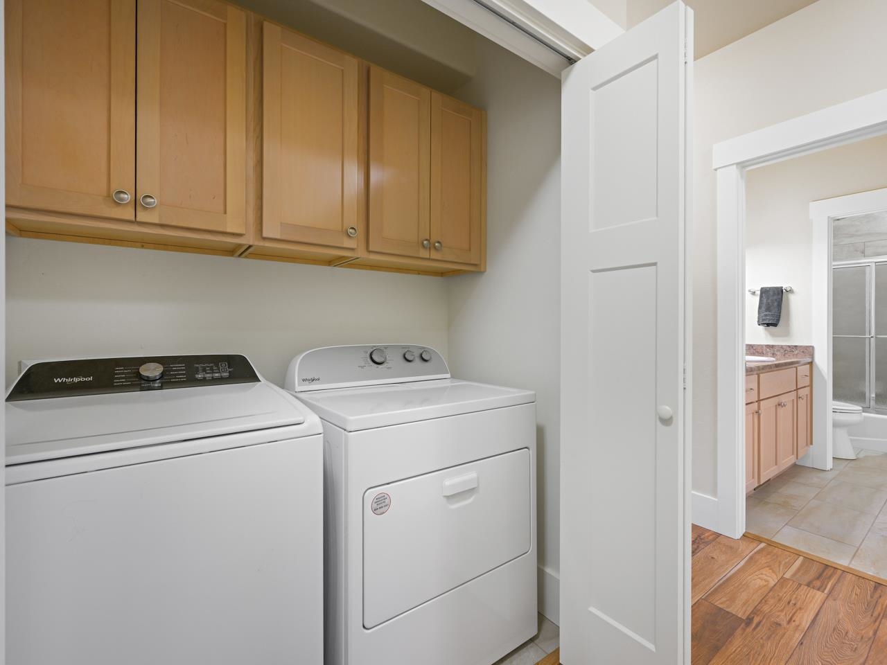 1245 Periwinkle Street Fruita, CO 81521 - Photo 21 of 34 a view of storage and utility room with washer and dryer