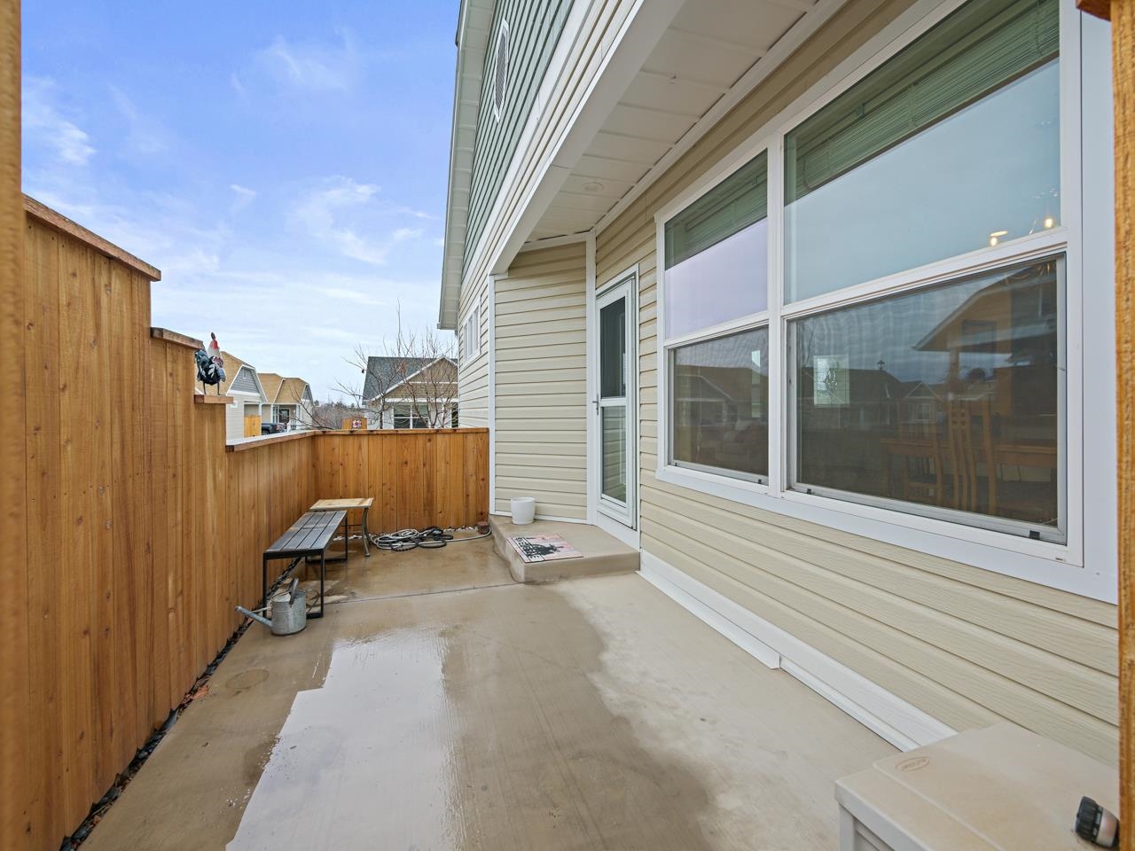 1245 Periwinkle Street Fruita, CO 81521 - Photo 30 of 34 a view of a balcony with chair and front door