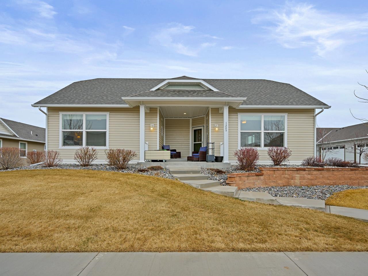 1245 Periwinkle Street Fruita, CO 81521 - Photo 33 of 34 a view of a house with backyard and sitting area